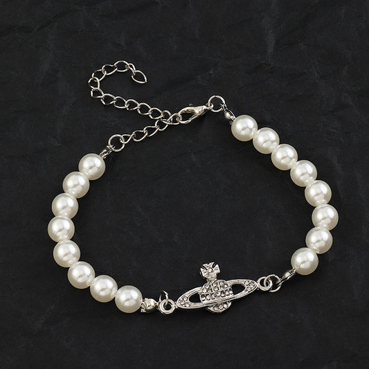 Saturn Pearl Bracelet