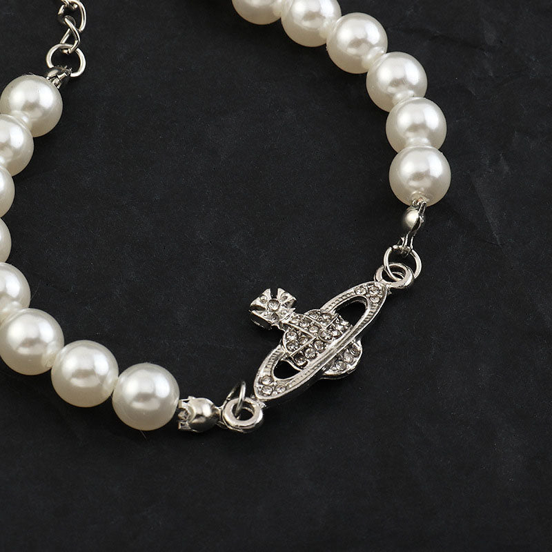 Saturn Pearl Bracelet