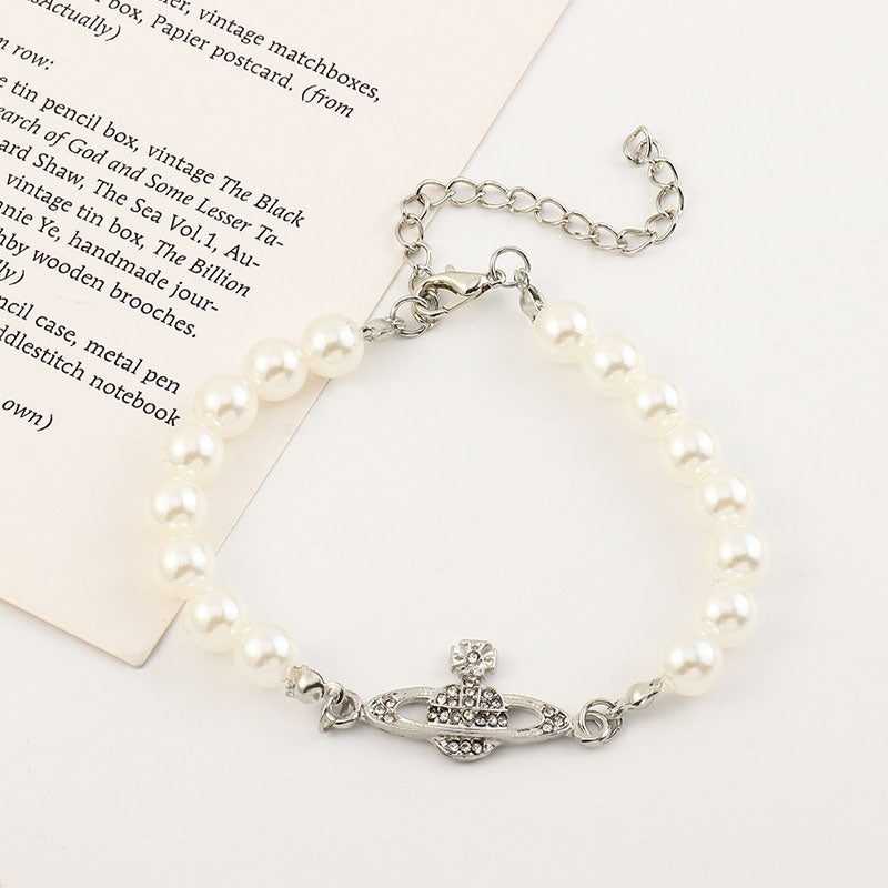 Saturn Pearl Bracelet