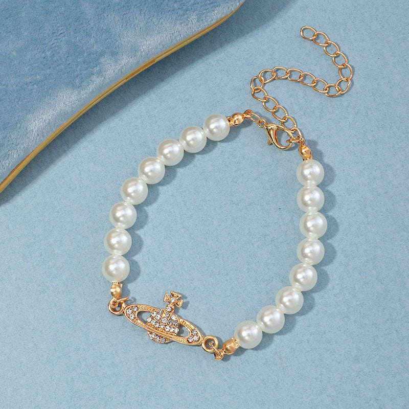 Saturn Pearl Bracelet